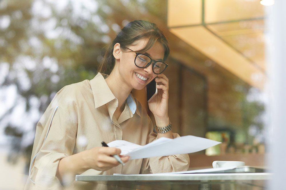 businesswoman-working-in-cafe-2022-02-02-03-58-59-utc